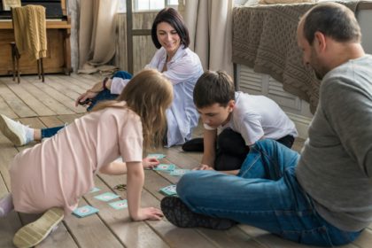 Family playing a board game